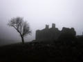mist over mountain ruin